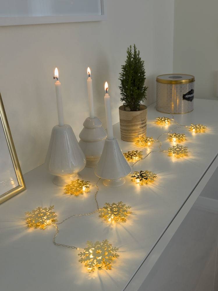 Guirlande lumineuse flocons de neige métal doré piles 1M 10 LED blanc chaud  câble transparent